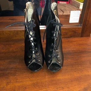 Black leather strap up boots